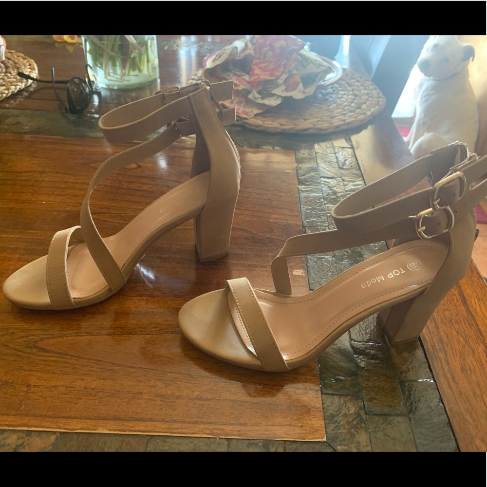 Tan colored medium heel shoe